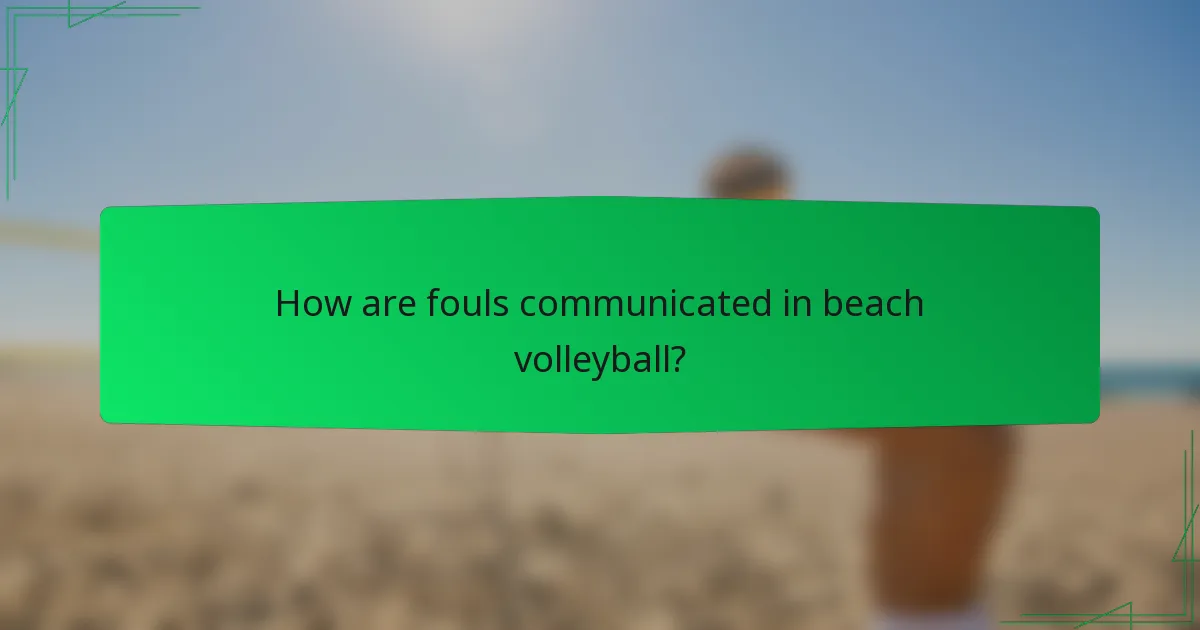 How are fouls communicated in beach volleyball?